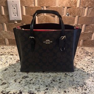 Brand new Coach purse with tags
